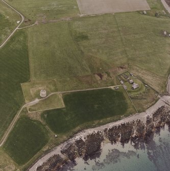 Hackness, oblique aerial view, taken from the E, showing the Martello Tower in the left half, and The Battery in the right half of the photograph.