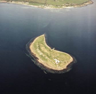 General oblique aerial view of Pladda centred on the lighthouse, taken from the SSW.