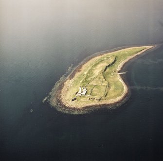 Oblique aerial view of Pladda centred on the lighthouse, taken from the SE.