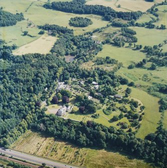 Oblique aerial view centred on the housel, taken from the N.
