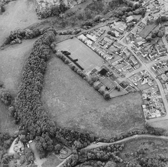 Oblique aerial view centred on the excavations of the Roman fort and possible annexe, taken from the ESE.