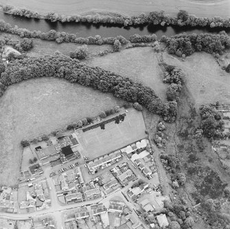 Oblique aerial view centred on the excavations of the Roman fort and possible annexe, taken from the N.
