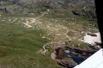 Oblique aerial view of holiday site at Bay of Clachtoll, Assynt, Sutherland, looking E.