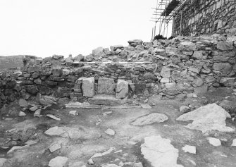 Excavation photograph - W face of E barmkin wall in Room II