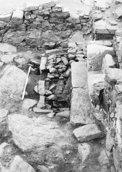 Excavation photograph - fireplace 21 in Room II