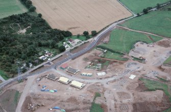 Aerial view of Holm Mains housing development, southern outskirts of Inverness, looking SW.