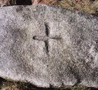 Detail of incised cross on the top of the stone