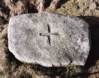 View of top of stone, showing incised cross