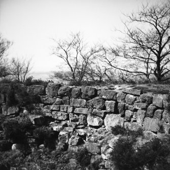 Tappoch Broch; scarecement on north west, from east.