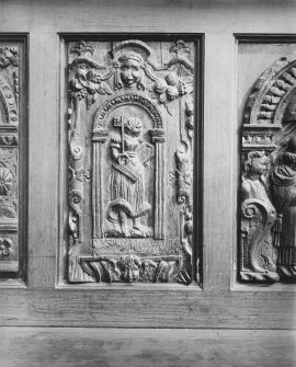 Interior.
Detail of carved panel on wooden seat