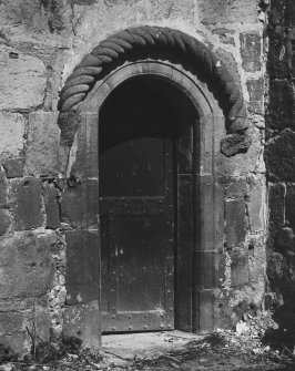 Detail of tower house doorway with rope moulding.