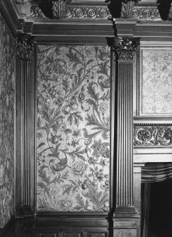 Interior.
Detail of foliate wallpaper and raised decorative pilasters on staircase landing.