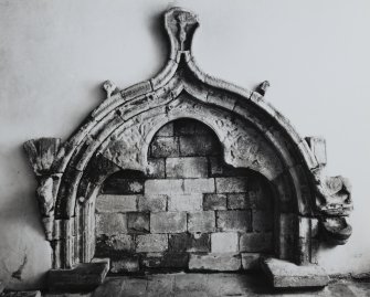 Iona, St Oran's Chapel, interior.
View of canopied tomb in South wall.