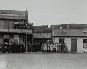 Photographic copy of glass negative showing View.  Workers being searched at entrance to danger area (2) (2650w)