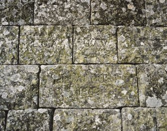 Detail of specimen carved initials of Queen Victoria and Prince Albert's children and date stone on north east face