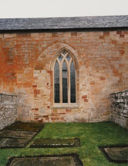 Fearn Abbey.  St. Michael's aisle, view from South showing traceried window and blocked arch.