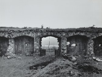 Bernera Barracks.
View of main entrance gateway and vaults in West wall, from East.