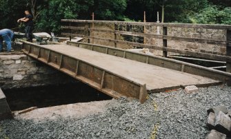 View from SE showing the reinstatement of the cast-iron beams in progress