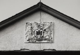 Detail of coat of arms in gable.