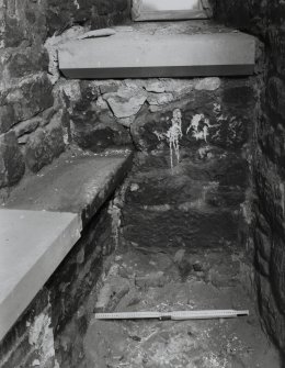 Edinburgh, Niddry Castle.
View of second floor of wing, West window embrasure showing fragment of original tiled floor and partly restored bench seat.