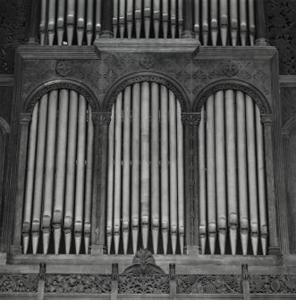 Interior, detail of organ showing elaborate carving