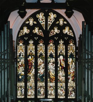 Interior, detail of stained glass window at west end
