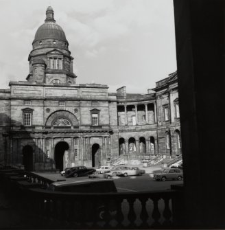 General view of Quadrangle looking East towards dome with cars parked in centre