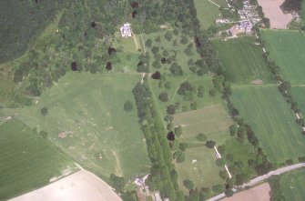 Castle Leod. 
Oblique aerial view, taken from the S, showing the tower-house, a possible golf course and the gate lodge.