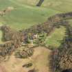 Oblique aerial view centred on the country house and towerhouse, taken from the WNW.
