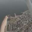 General oblique aerial view of Broughty Ferry, the castle and harbour, taken from the NE.
