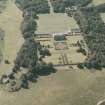 Oblique aerial view of the country house and policies, taken from the ESE.