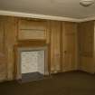 Interior. Ground floor, S room, view showing panelling and fireplace