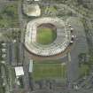 Oblique aerial view centred on the stadium, taken from the WSW.