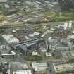General oblique aerial view of Cowcaddens and Townhead centred on the university, taken from the SW.
