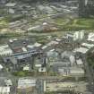 General oblique aerial view of Cowcaddens and Townhead centred on the university, taken from the SW.