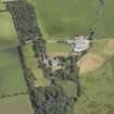 Oblique aerial view centred on the country house, walled garden, lodge, farmhouse and farmsteading, taken from the S.