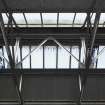 Interior.  Detail of roof light and roof trusses in Shed 3.