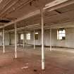 Interior. Old mill building, 2nd floor, view from NE. Three bays deep, cast iron columns and wooden floor beams