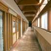 Interior. Admin block. View of 1st floor corridor with clerestory glazing to main hall