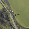 Oblique aerial view centred on Stow Kirk and Old Stow Bridge, taken from the N.