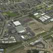 Oblique aerial view centred on site of new RCAHMS archive store, taken from the NE.