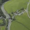 Oblique aerial view centred on the bridge with the farmsteading adjacent, taken from the NW.