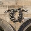 Detail of wreath decoration on E front