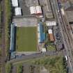 Oblique aerial view centred on the football ground, taken from the SE.