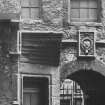 View of entrance to Riddel's Close, Edinburgh.
Titled: "Riddells' Close, High Street.  August 1903"
