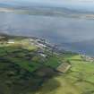 General oblique aerial view of Bowmore village, Islay with Loch Inndal beyond, taken from the SE.