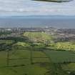 General oblique aerial view of the town centred on the racecourse with Arran and Kintyre in the distance, taken from the E.