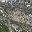 Oblique aerial view centred on the site of redevlopment with the Council Offices adjacent, taken from the NW.