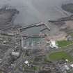 Oblique aerial view of Arbroath centred on the harbour, taken from the NNW.