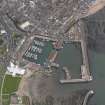 Oblique aerial view centred on Arbroath harbour, taken from the SW.